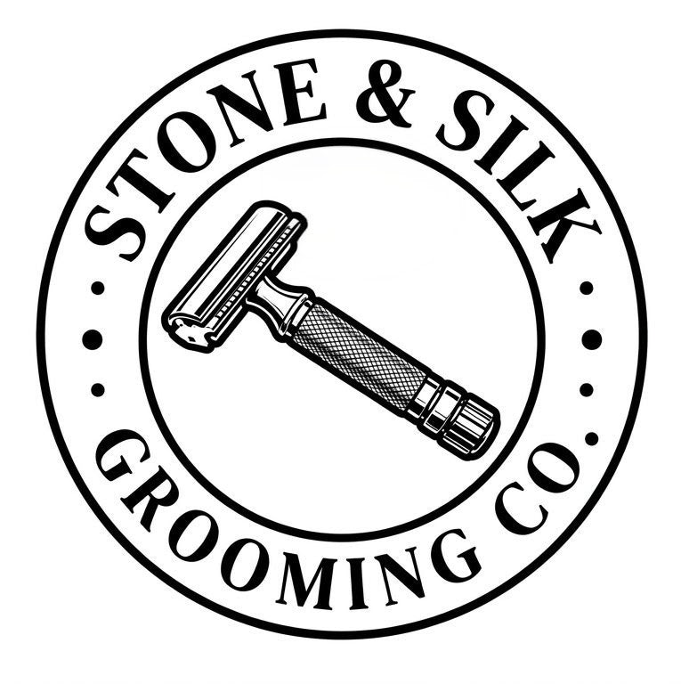 A circular black-and-white logo reading “STONE & SILK GROOMING CO.” with a vintage-style safety razor illustration in the center.
